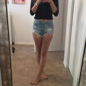 Distressed denim shorts